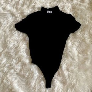 Women’s PrettyLittleThing bodysuit.  Good quality. Still in good condition.